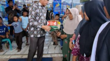Kepala Desa Sontang Zulfahrianto, Resmikan Indomaret Syukuran & Pembagian Sembako
